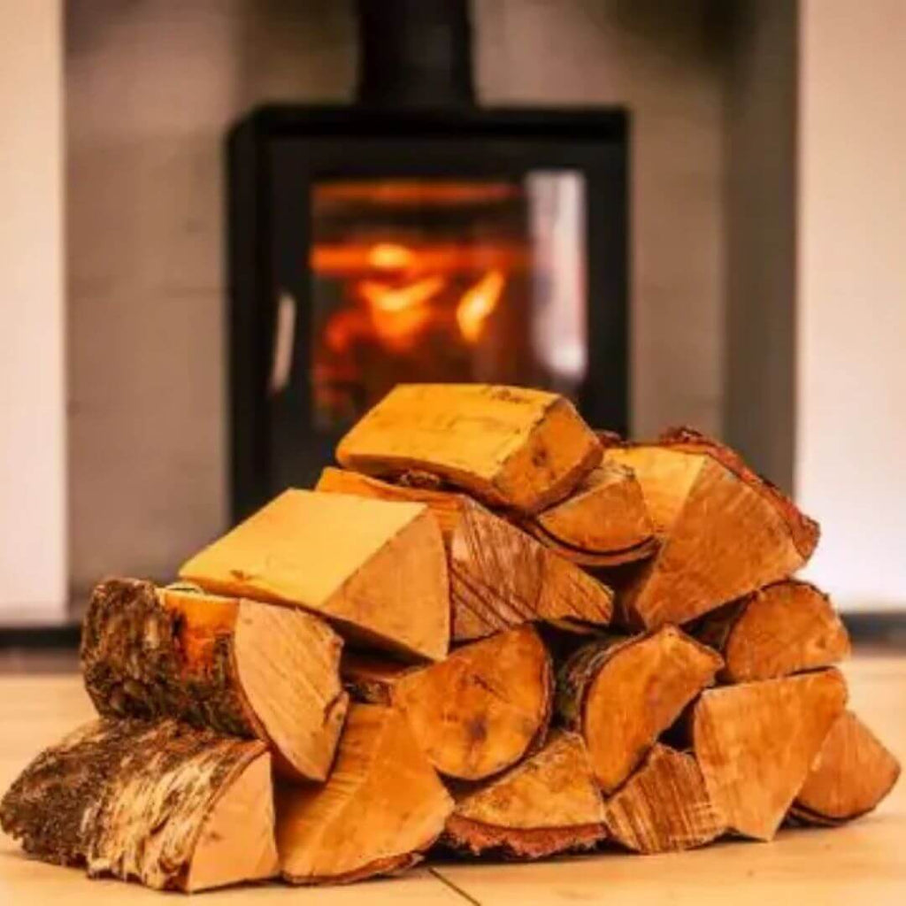 Firewood stacked in front of stove