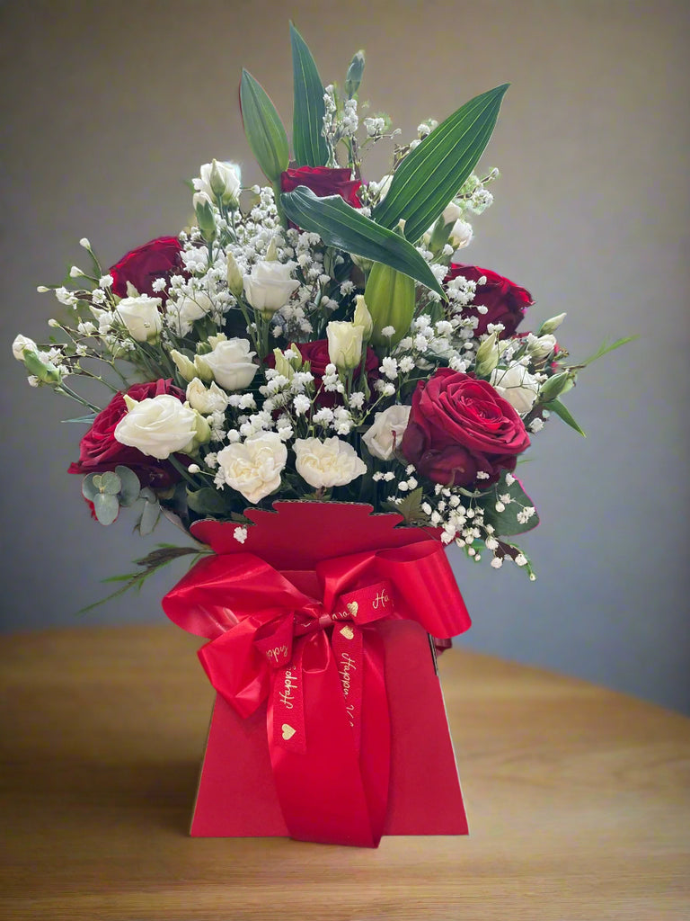 red rose hatbox arrangement